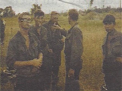 Gonzales (far right) needs help identifying these men